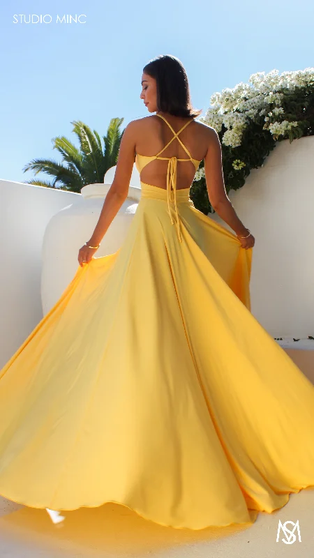 COSMO - Canary Yellow Formal Dress with cut outs and leg split